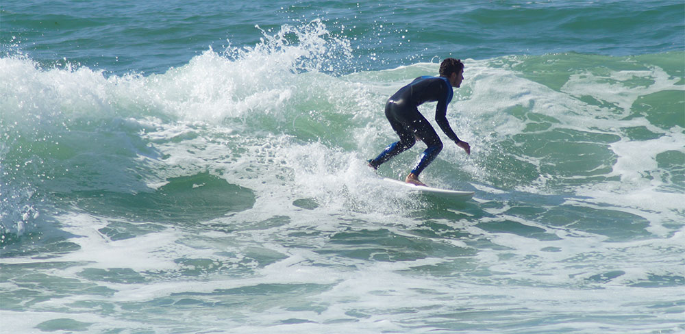 Zon, zee en strand en golfsurfen